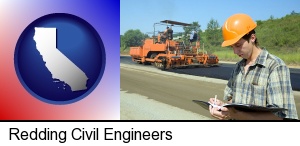 a civil engineer inspecting a road building project in Redding, CA