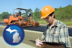 michigan map icon and a civil engineer inspecting a road building project