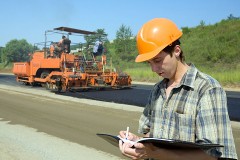 a civil engineer inspecting a road building project