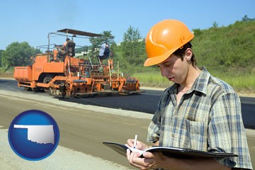 a civil engineer inspecting a road building project - with Oklahoma icon