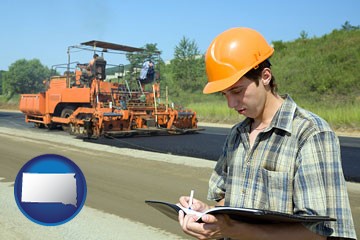 a civil engineer inspecting a road building project - with South Dakota icon