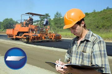 a civil engineer inspecting a road building project - with Tennessee icon